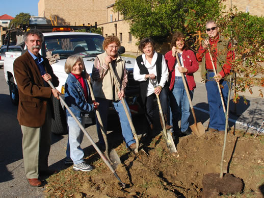 From left: Dr. Luther Brown, director of Delta State University Delta Center for Culture and Learning; Dorothy Shawhan, professor emeritus of English; Linda Smith, director of Facilities Management; Lee Aylward, of the Delta Center for Culture and Learning; Dr. Nina Baghai-Riding associate professor of biology; and Mark Ponder, chair of City Beautification Committee and the Cleveland Tree Board, put the finishing touches on planting a tree in honor of National Arbor Day.